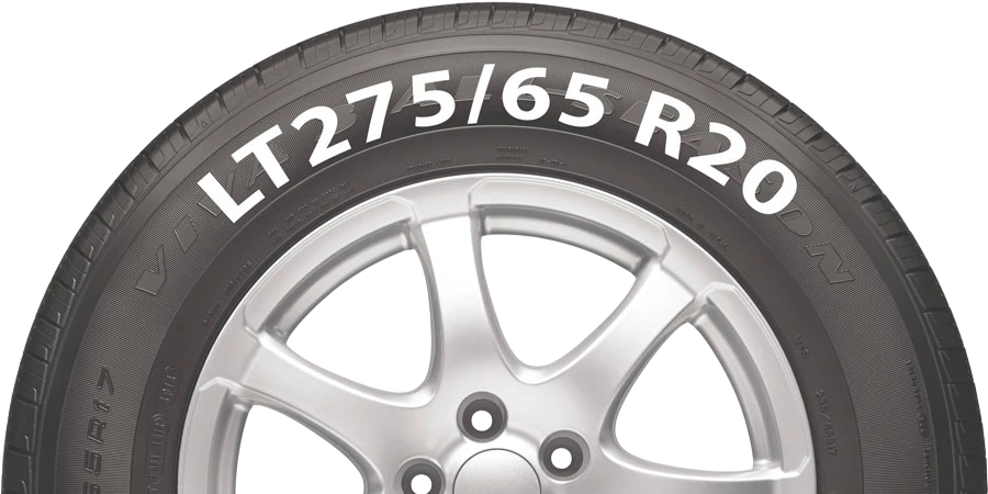 A tire sidewall reading LT275/65 R20
