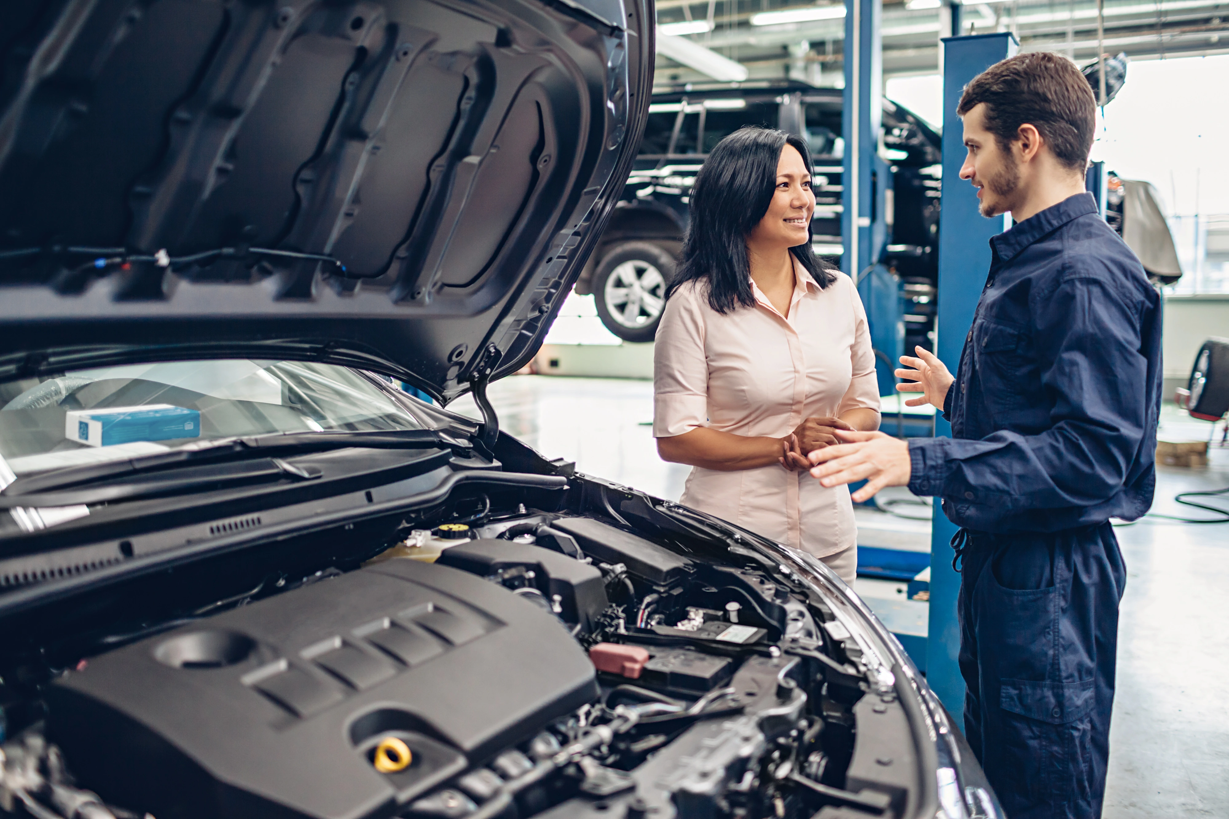 Point S certified technician servicing a vehicle